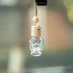 Car Skull Perfume Bottle Aromatherapy Essential Oil  Hanging Auto Air Freshener