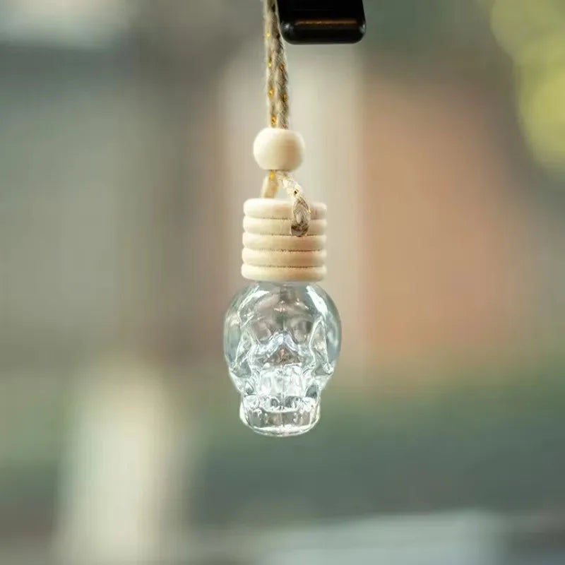 Car Skull Perfume Bottle Aromatherapy Essential Oil  Hanging Auto Air Freshener